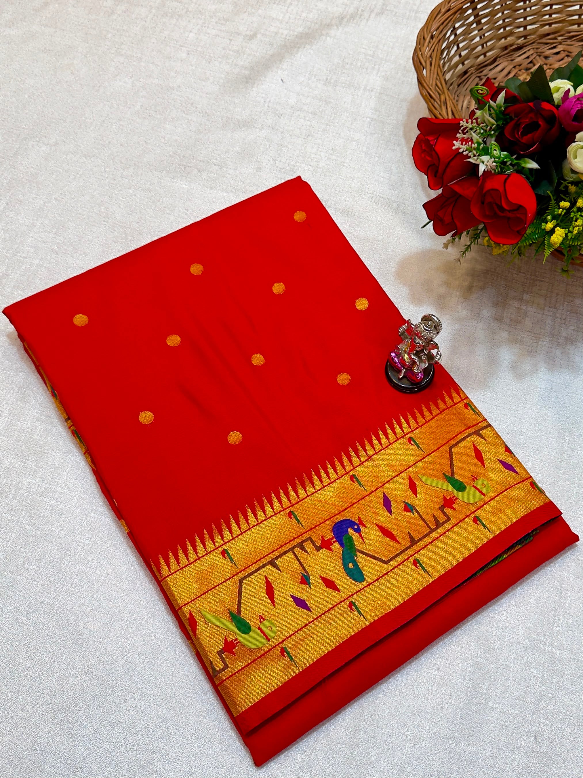 Paithani Saree in premium Katan Silk with a rich Red body, all-over zari butti, traditional Mor Popat brocade pallu and border, and exclusive running blouse piece, perfect for weddings, festive occasions, and traditional wear.