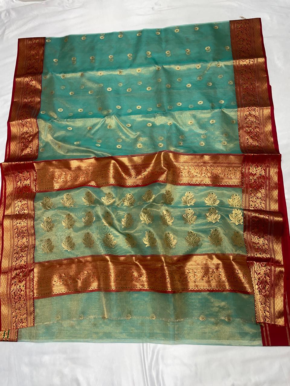 Premium Aqua Blue Katan Tissue Silk Chanderi Saree with Zari Buti & Rich Contrast Woven Border