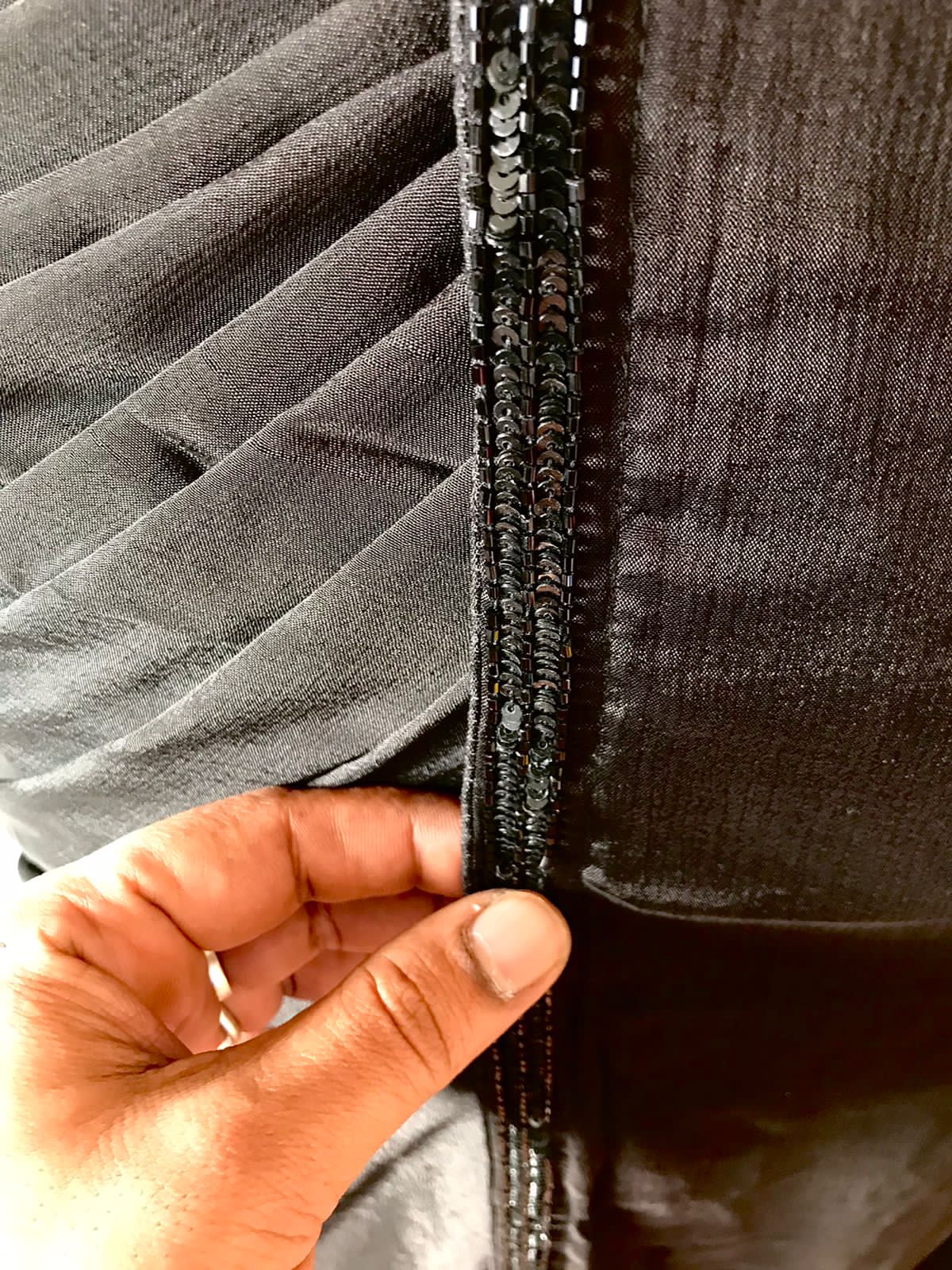 “Sonali Bendre-Inspired Black Chinnon Crepe Silk Saree with Multicoloured Floral Pearl Work”