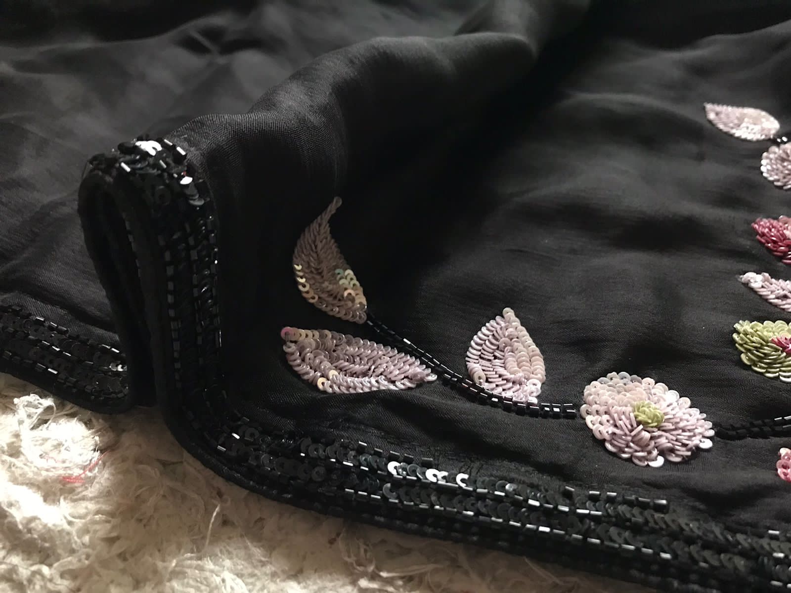 “Sonali Bendre-Inspired Black Chinnon Crepe Silk Saree with Multicoloured Floral Pearl Work”