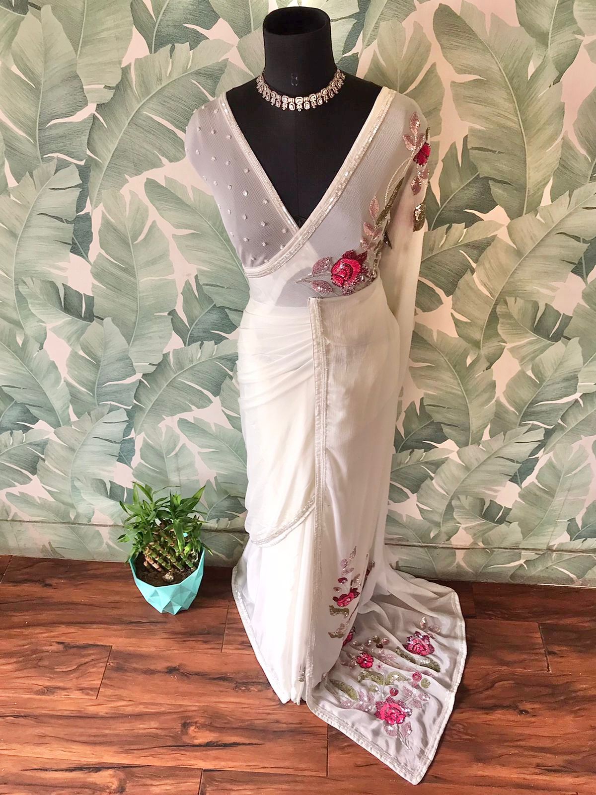 “White Premium Chinnon Crepe Silk Saree with Multicoloured Floral Sequins & Cut-Dana Work”