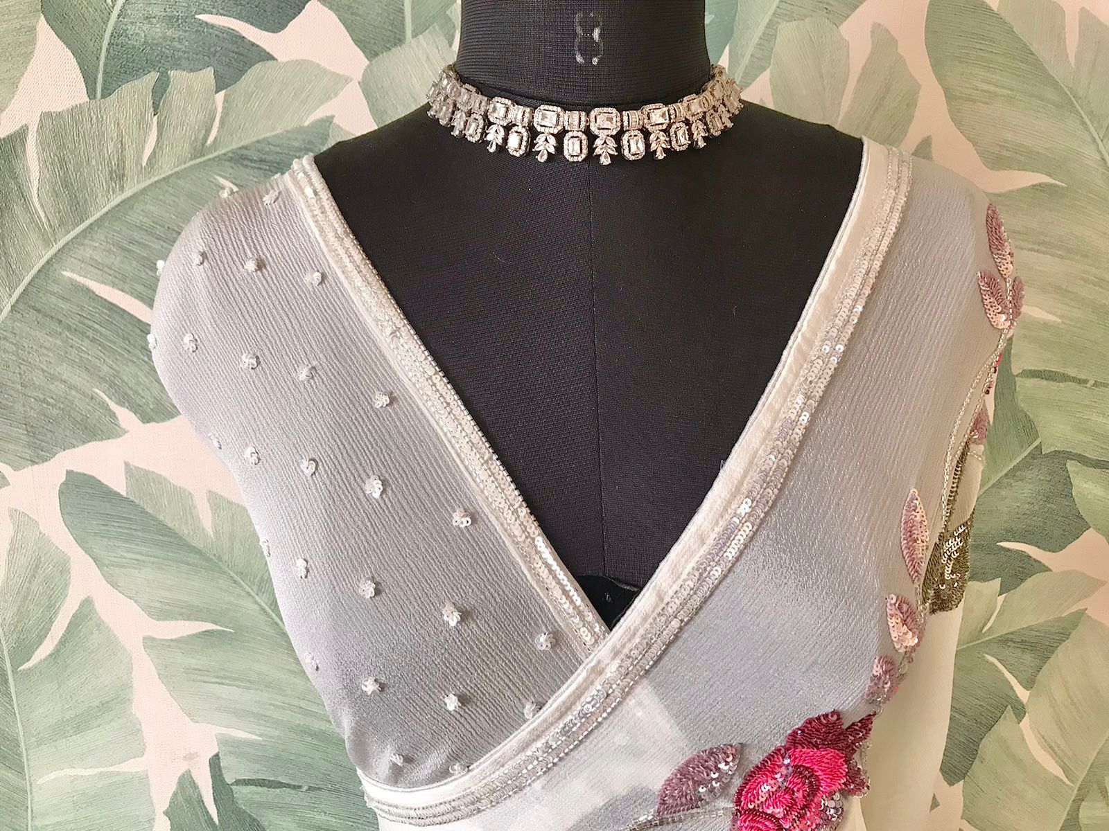 White Premium Chinnon Crepe Silk Saree with Multicoloured Floral Sequins & Cut-Dana Work