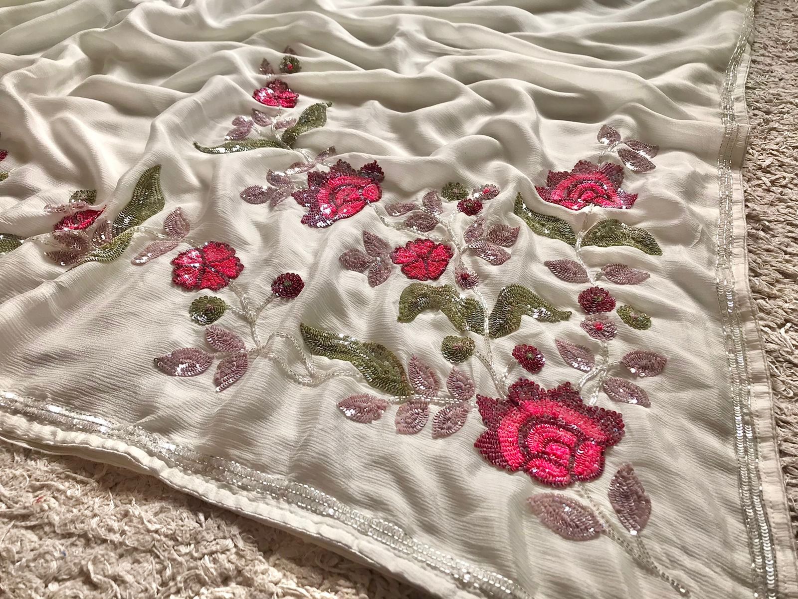 White Premium Chinnon Crepe Silk Saree with Multicoloured Floral Sequins & Cut-Dana Work