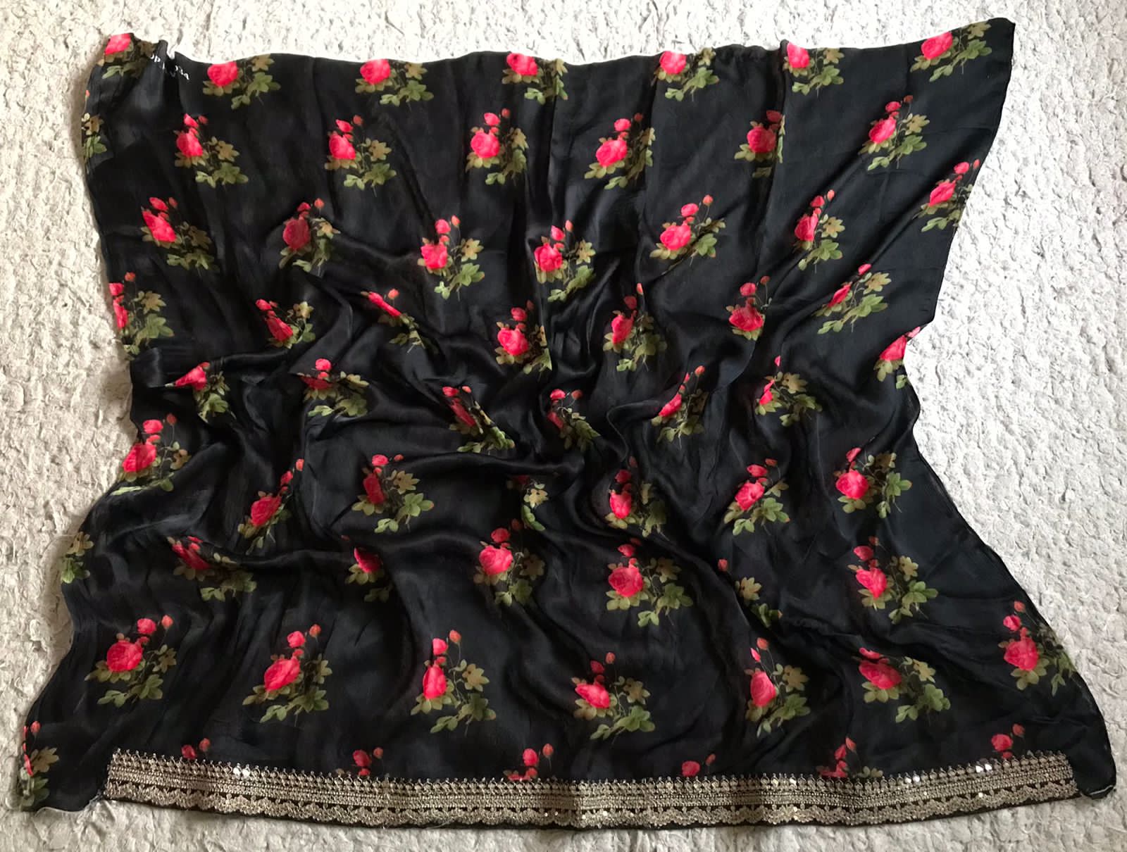 “Elegant Sabyasachi Style Black Saree with Statement Floral Print & Exclusive Lace Borders”