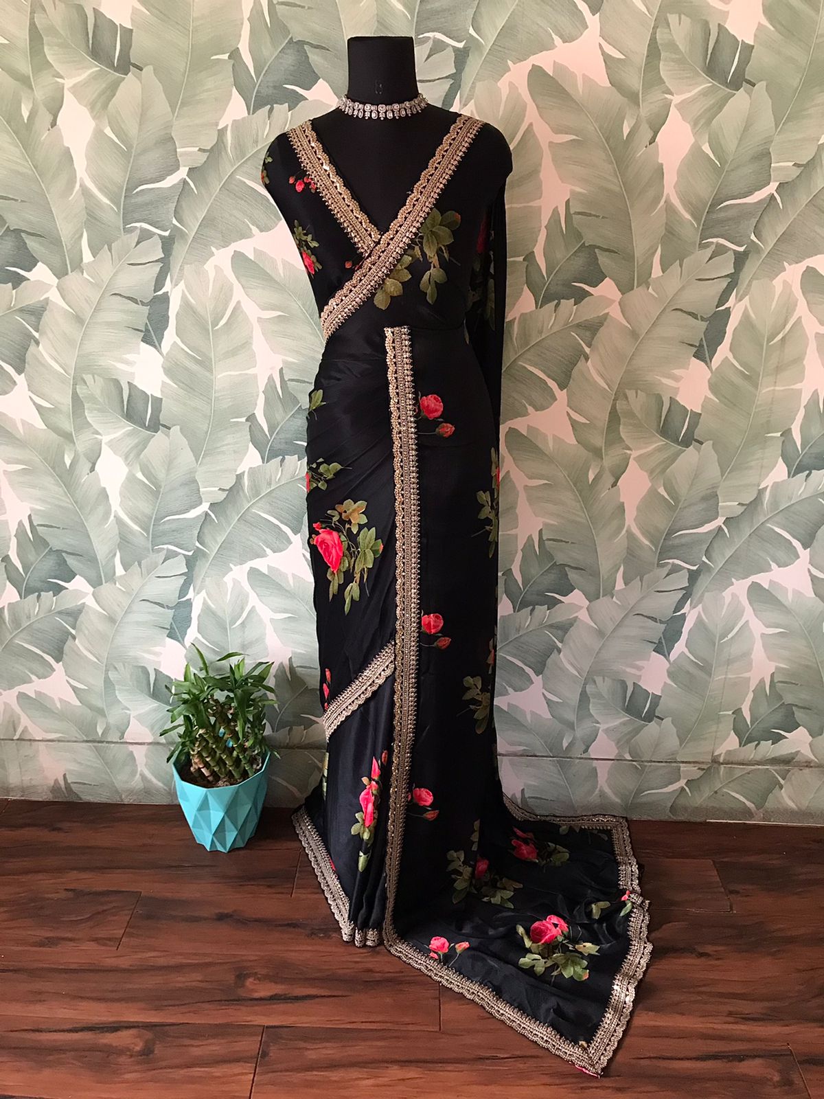 “Elegant Sabyasachi Style Black Saree with Statement Floral Print & Exclusive Lace Borders”