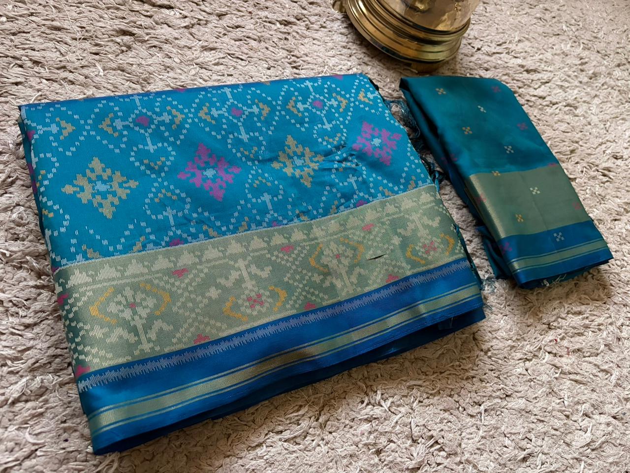 Premium Patan Patola Silk Saree with Intricate Multicoloured Weaving & Signature Patola Motifs