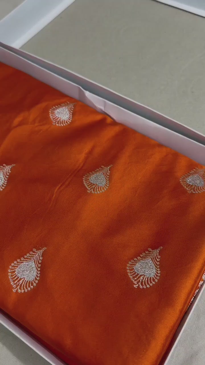 Beautiful Banarasi Mashru Silk Handloom Woven Saree featuring intricate traditional woven motifs, rich Banarasi craftsmanship, elegant border, luxurious drape, and matching blouse piece, perfect for weddings, festive occasions, and ethnic celebrations.